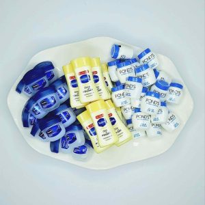 Mini Vaseline cream and Vaseline and Ponds mini lotions for travel and handbag